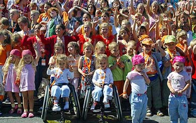 More than 700 pairs of twins attend a photo call at the third annual twin meeting hosted by German pharmacy maker Ratiopharm in Berlin on Saturday