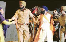 A scene from "Tukde Tukde Zindagi", staged at Tagore Theatre, Chandigarh