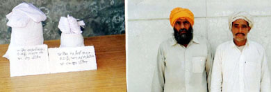 Puran Singh and Jarnail Singh with heroin recovered from their possession