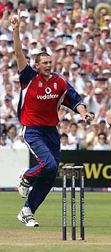 Englands Stephen Harmison celebrates the dismissal of Australias Adam Gilchrist during their triangular series one-day match in Bristol on Sunday