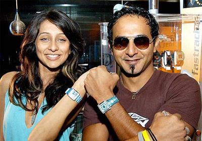 Video Jockeys Nikhil and Anusha display a new range of Fastrack watches in Bangalore on Tuesday