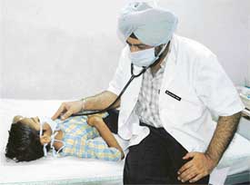 Dr Baldeep Singh examines Sahil in Ludhiana on Wednesday