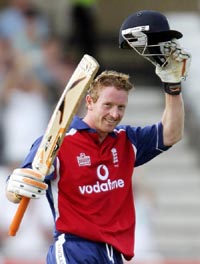 Englands Paul Collingwood celebrates on completing his century during the one-day international match against Bangladesh