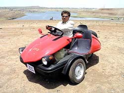 Mohd Zafar, an architect, with his remodelled scooter-car called ZF-2 in Bhopal on Thursday. 
