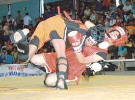 A player from UP overpowers a Chandigarh player at 5th sub-junior National Wushu Championship in Chandigarh on Thursday.