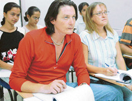 Brian and Joanne Rogers concentrate during their German theory lessons.