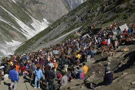 Pilgrims take a break on way to the holy Amarnath cave near Baltal. Security has been intensified due to militants recent attacks in the valley