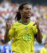 Ronaldinho of Brazil celebrates his teams second goal during their Confederations Cup soccer match against Japan at Cologne in Germany