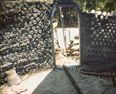 the earthship shelter on the Andamans is made of bottles, tyres, plastic and bamboo