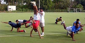 Indian hockey players perform exercises during a camp in Patiala on Friday.