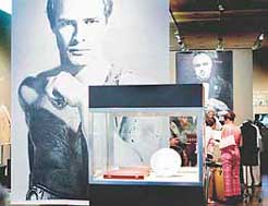 Posters of legendary actor Marlon Brando are displayed at Christie's Auction house during a press preview of an auction of Brando's personal properties, in New York on Friday
