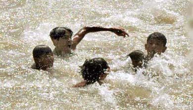 Young boys find an easy way out to beat the heat by jumping in Sidhwan canal on a sultry Saturday afternoon in Ludhiana