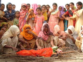 Residents of Siwia burn a rag doll to appease the raingod