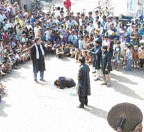 Neelima and Shamsul perform a street play
