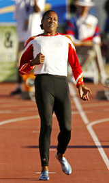 Marion Jones warms up before the start of her heat in the womens 100m dash during the US championships at Home Depot Centre in Carson, California