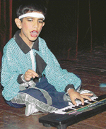 Avtansh Behal performs on synthesiser at Tagore Theatre on Sunday.
