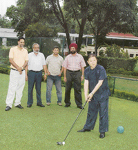 Sun Yuxi, Ambassador of Peoples Republic of China to India, tees off at the Chandigarh Golf Club on Sunday. 