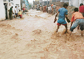 An internal road in Kishangarh village that was converted into a virtual canal due to heavy downpour 