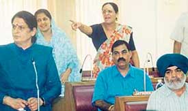 BJP councillor Kamla Sharma makes a point at the Municipal Corporation House meeting in Chandigarh on Monday