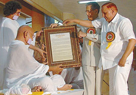 His Holiness Jain Muni Acharya Shri Mahapragya being presented a momento by Delhi Lt-Governor B. L. Joshi and Delhi Mayor Satbir Singh at Adhyatma Sadhna Kendra in the Capital on Monday.