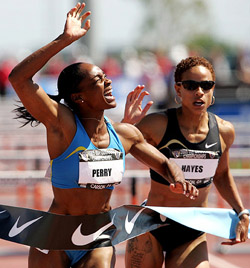 Michelle Perry celebrates on winning the womens 100 m hurdles final in 12.66 seconds during the USA Track and Field Championships in Carson