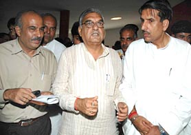 Haryana Chief Minister Bhupinder Singh Hooda comes out from a meeting of PCC delegates at Tagore Theatre, Chandigarh, on Wednesday.