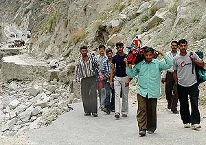 It is a walkathon for residents who have been trudging miles on foot to reach their destination. This group was crossing Karchham in Kinnaur district on Wednesday.