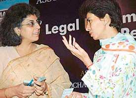 Kumari Selja, Minister of State for Urban Development and Poverty Alleviation, has a word with delegates during a seminar