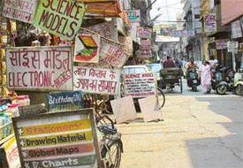 Shops at the Mitha Bazaar in the city vie to catch attention of students interested in buying ready-made science projects