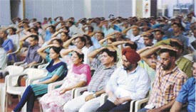 Participants at a lecture on pranayam and meditation, organised by the health education cell of the DMCH in Ludhiana on Wednesday
