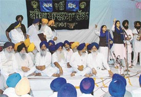 SAD chief Parkash Singh Badal along with Akali workers at a function at Gurdwara Sabzi Mandi to commemorate the birth anniversary of Master Tara Singh 
