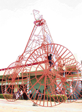 A gigantic tricycle, 41.7 ft tall, claimed to be the worlds largest, built by K.  Sudhaker of Hyderabad.