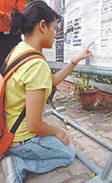 A disappointed admission seeker after scanning the second cut-off list at a Delhi University college on Thursday