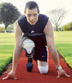 Paralympic champion Oscar Pistorius, who has hi-tech carbon fibre blades below his knees, is keen to run with able-bodied athletes at the Beijing Olympics