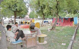 Cable laying work is in progress in Sector 21. The residents have a genuine complaint about the area being spoiled by a labourers on work as they ease themselves anywhere or everywhere in the adjoining children park or the residential area nearby. 