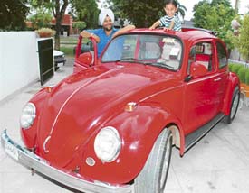 Pritipal Singh with his restored 1968 Volkswagen Beetle.