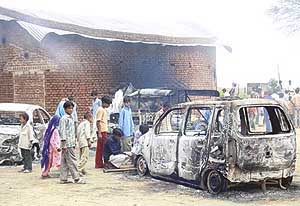 Vehicles burnt down by irate villagers following a firing incident at Pipaka village in Mewat, Haryana, on Saturday.