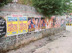 Posters of movies and other forthcoming events deface the city walls