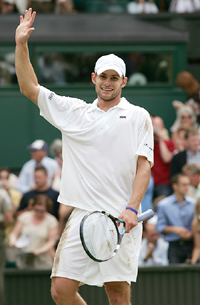 Andy Roddick of the USA celebrates after winning his mens singles semifinal against Swedens Thomas Johansson at the Wimbledon tennis championships in London
