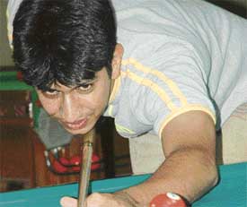 Sameer Bhalla plays a shot during Ch Vishnu Pal Singh Memorial 9-Ball Pool Prize Money Tournament at Chandigarh Billiards and Coaching Centre, Sector 22