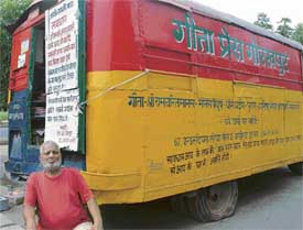 A stranded bus near Sector 17 Bus Stand works as a shop selling religious books