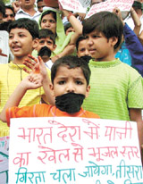 Childrens under the banner of Sangharsh Bharti Mitra Sangthan protest against bottled water at Jantar Mantar in the Capital