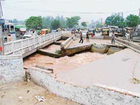 The collapsed bridge on Sidhwan Canal on Gill Road in Ludhiana on Sunday