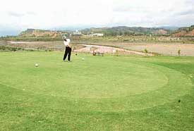 A day before the start of the Chandigarh Junior and Sub-Junior Golf Tournament, a golf enthusiast tees-off at the Panchkula Golf Club