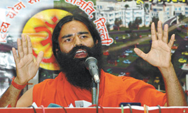 Swami Ramdev of Divya Yog Sadhna Samiti addressing a press conference at Constitution Club in the Capital 