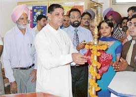 Mr Rakesh Pandey, state Minister for Science and Technology and Industrial Training, Punjab, inaugurates branch of GT Computer Hardware Engineering College, Jaipur, at Model Town extension in Ludhiana on Monday
