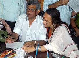 CPM Politburo members Sitaram Yechuri and Brinda Karat file nomination papers for the Rajya Sabha from West Bengal in Kolkata on Monday. 