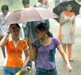 Rain or sunshine, an umbrella is always out and open. This frame shows two girls in Sector 23 protecting themselves from the heavy rains that lashed Chandigarh on Tuesday