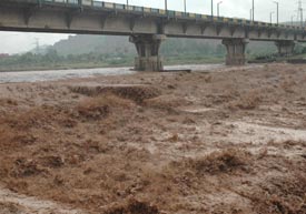 The Ghaggar in spate near Panchkula on Tuesday