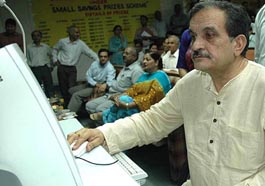 The Finance Minister, Mr Birender Singh, takes out the draw for small savings prizes at Panchkula on Tuesday.